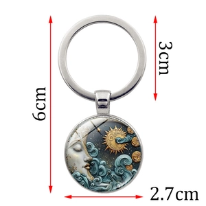 Silver sun and moon goddess time gem keychain with measurements on white background
