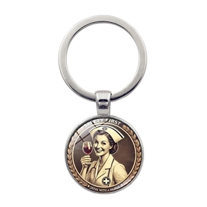 Vintage nurse themed keychain with circular metal pendant and Safety First funny print