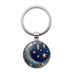 Silver celestial sun and moon glass gem keychain with star and lantern design