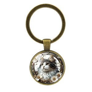 Vintage bronze cat time gem keychain with elegant long-haired cat and flower illustration