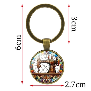 Vintage sewing machine keychain with bronze metal ring and colorful glass art pendant