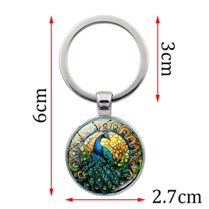Detailed view of 2.7cm colorful peacock pendant keychain with size measurements