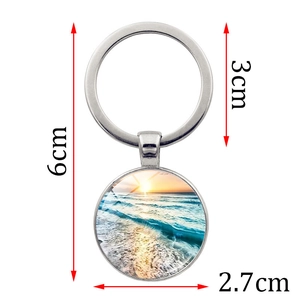 Dimensions détaillées du porte-clés en métal de 6cm avec pendentif paysage de coucher de soleil