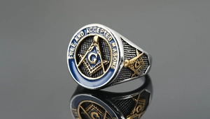 Macro shot of Masonic ring with blue enamel and Free and Accepted Masons engraving