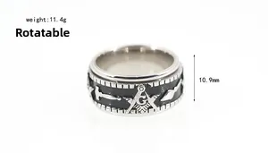 Macro detail of rotatable 11.4g Masonic spinner ring in black and silver steel