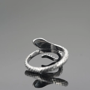 Vintage punk style snake ring in polished silver steel with detailed scale texture