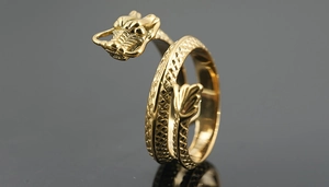 Macro detail of golden dragon ring showing intricate scales and craftsmanship