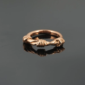 Titanium steel braided rope ring with triple knot design in elegant rose gold finish