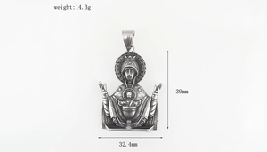 Detailed view of Virgin Mary religious pendant with 39mm height and 32.4mm width dimensions