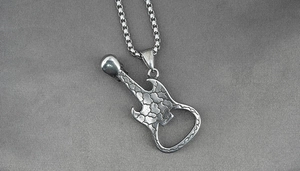 Detail of guitar bottle opener pendant necklace with vintage silver crackle texture finish