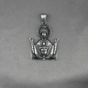 Vintage Virgin Mary religious pendant in stainless steel with oxidized relief details