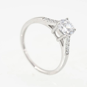 Classic silver titanium steel solitaire ring with a sparkling round diamond setting