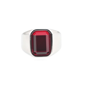 Polished silver ring for men with a large rectangular red gemstone on white background