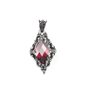 Gothic vintage silver pendant with large rhombus red gemstone and floral relief