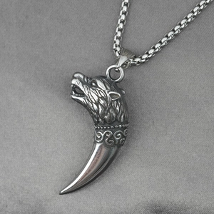 Collier vintage en acier inoxydable avec pendentif tête de loup et dent pour homme