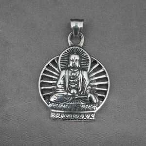 Minimalist silver titanium steel Buddha pendant with radiant lotus flower design