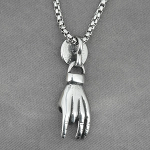 Punk rock style stainless steel necklace featuring a vintage evil eye hand gesture pendant
