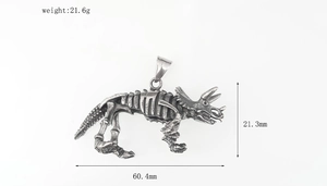 Detailed triceratops skeleton pendant with vintage oxidation, measuring 60.4mm in length