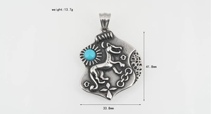 Shield pendant with turquoise inlay and wolf relief showing 41.8mm height dimension