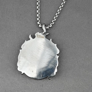 Pendaglio collana fiamma in acciaio al titanio con incisione S.Steel e finitura spazzolata