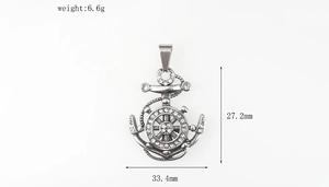 Macro shot showing dimensions and diamond encrusted anchor pendant details