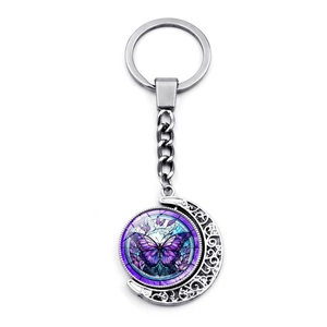Porte-clés lune rotatif avec pendentif papillon violet en verre et métal argenté