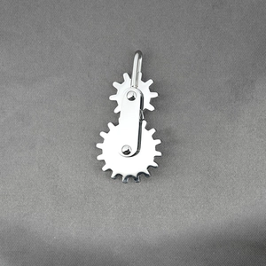 Polished silver rotating gear pendant necklace with mechanical industrial style design