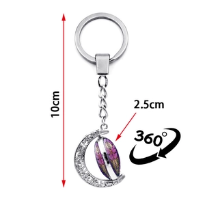 Portachiavi rotante con ciondolo luna libellula viola in lega d'argento e rotazione a 360°