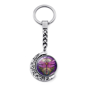 Portachiavi pendente luna rotante con libellula viola in lega di metallo argento lucido