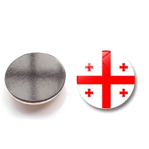 Detailed view of the Georgian flag fridge magnet with a polished glass surface and magnetic back