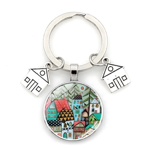 Detail of artistic starry sky tree house crystal glass keychain with metal ring