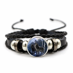 Vintage multi-layer braided leather bracelet with wolf howling in snow night design