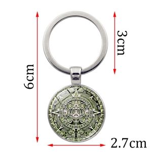 Detailed size view of the Aztec Sun Stone calendar keychain showing the 2.7cm pendant diameter