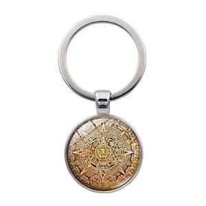 Aztec sun calendar keychain with Mayan totem glass cabochon in silver metal finish