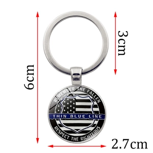 Thin Blue Line police badge keychain featuring US flag shield pendant and metal keyring