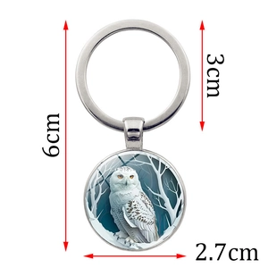 Silver metal keychain with white owl glass gem pendant and 3cm ring diameter dimensions