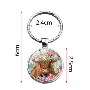 Highland cow keychain with floral crown pendant in silver metal finish 6cm length