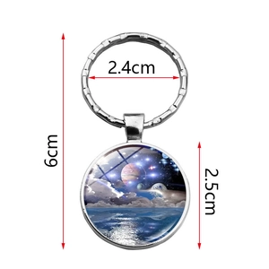 Porte-clés Galaxie en verre et métal argenté avec pendentif étoilé de l'espace cosmique