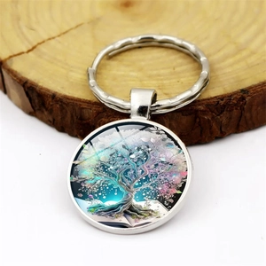 Tree of Life glass cabochon keychain pendant on silver metal ring and wood base