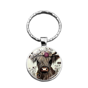 Porte-clés créatif avec pendentif vache des Highlands et couronne de fleurs