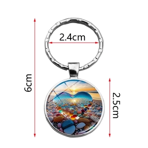 Sunset beach glass cabochon keychain with heart-shaped light effect on metal ring