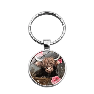 Artistic Highland Cow keychain with floral pattern and silver metal ring for bags