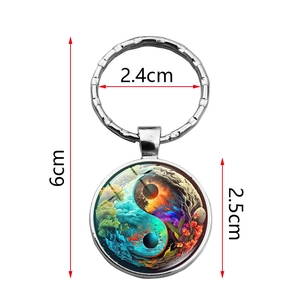 Yin Yang Tree of Life glass cabochon keychain with colorful nature landscape pattern