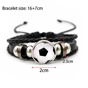 Detail shot of soccer glass gem charm on multi-layer braided leather bracelet with dimensions