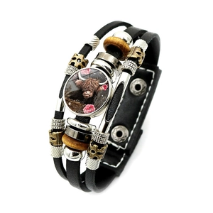 Bracciale multistrato in pelle bohémien con ciondolo floreale e mucca Highland