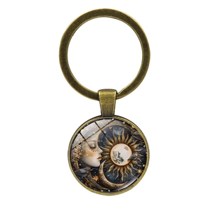 Vintage sun and moon glass cabochon keychain with bronze metal ring and celestial art
