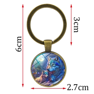 Portachiavi lupo che ulula alla luna in metallo con ciondolo cabochon in vetro blu 6cm