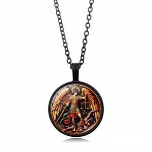 Close-up of Archangel Saint Michael circular pendant with glass cabochon finish