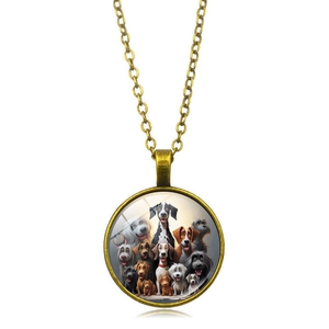 Detailed close-up of a vintage bronze dog portrait glass pendant necklace on white background