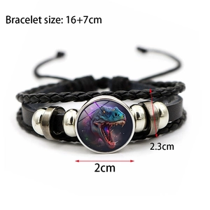 Detail showing 16+7cm adjustable multilayer braided leather bracelet with dinosaur cabochon